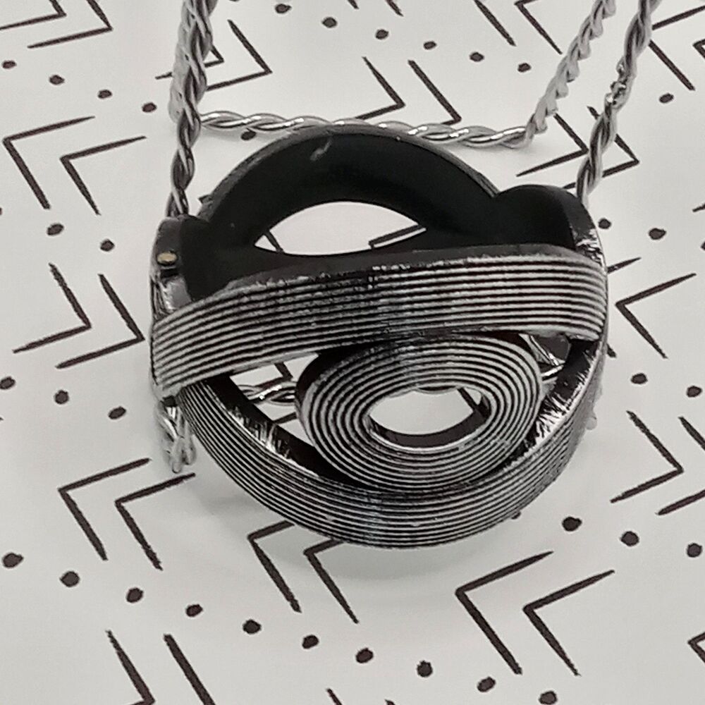 Black with Silvertones Braided BRACELET Snap On Plastic Bangle Swirls EYE Shape